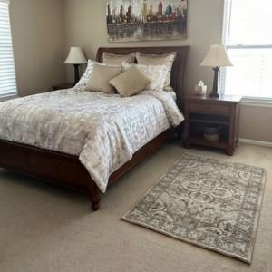 Karastan area rug in a bedroom