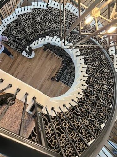 black carpet on spiral staircase