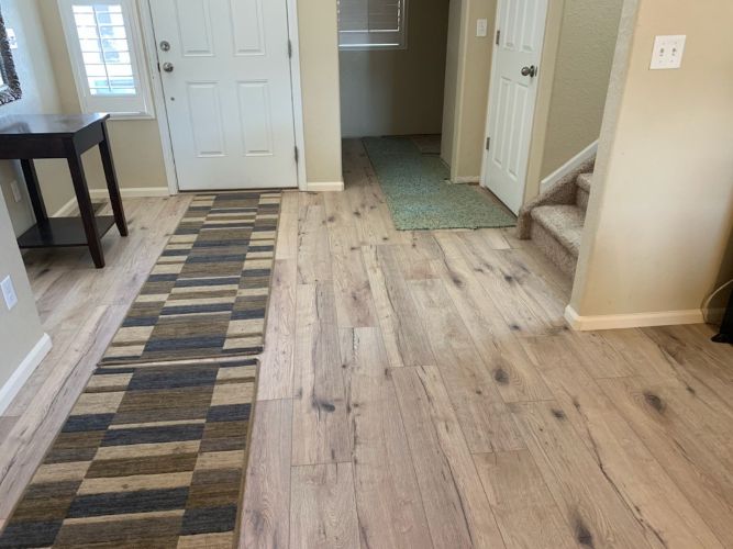rustic plan flooring in entryway