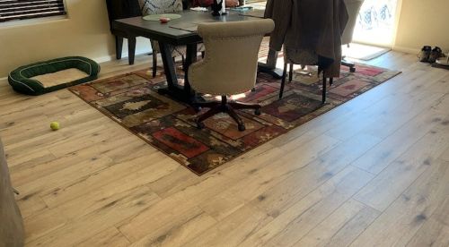 Oak plank flooring in dining room